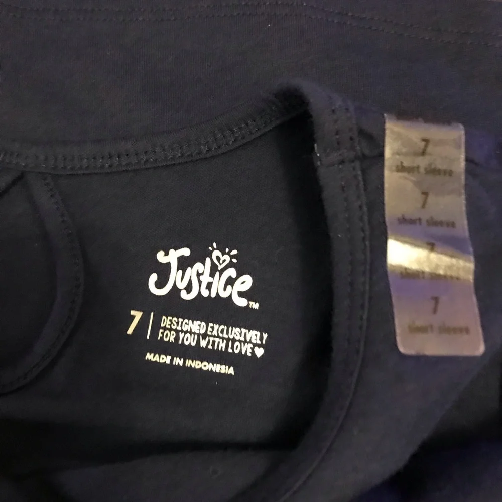 Justice girl’s dark blue size 7 t-shirt. New with size tag on shoulder